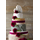 The beautiful 6 tier "Behold" Wedding cake featuring mature cheddar, Cornish Brie, Yarg, stilton, White nancy and Coeurs Neufchatel.  Decorated with Red ribbons and flowers.