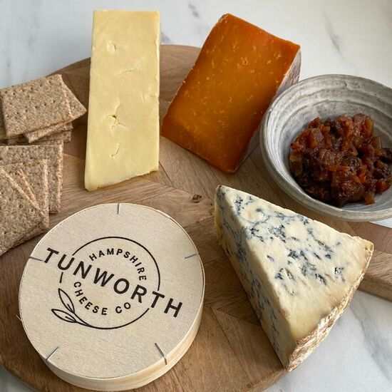 Four cheese gift consisting of Tunworth Camembert, Colston Bassett Stilton, Lincolnshire Poacher & Sparkenhoe Red Leicester