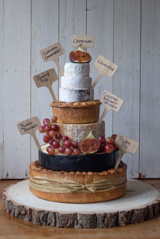 Pork Pie and Cheese Cake with two pork pies and 5 cheeses decorated with wooden cheese tags