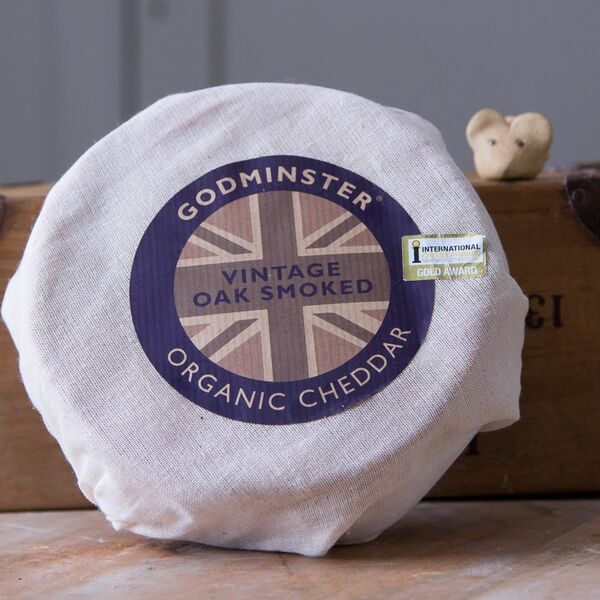 Godminster Smoked cheddar wrapped in cloth