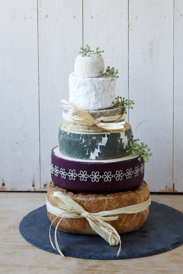 Cheddar & Pork Pie Cheese Cake, with Pork Pie base and five cheeses decorated with ivory raffia