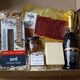 Food gift box with charcuterie, cheese, crackers, chocolates, Prosecco and chutney